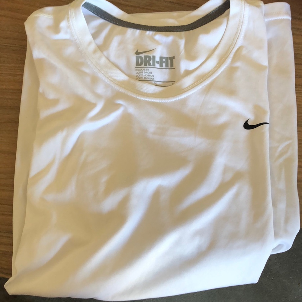 Two Nike Dri-fit short sleeve shirts